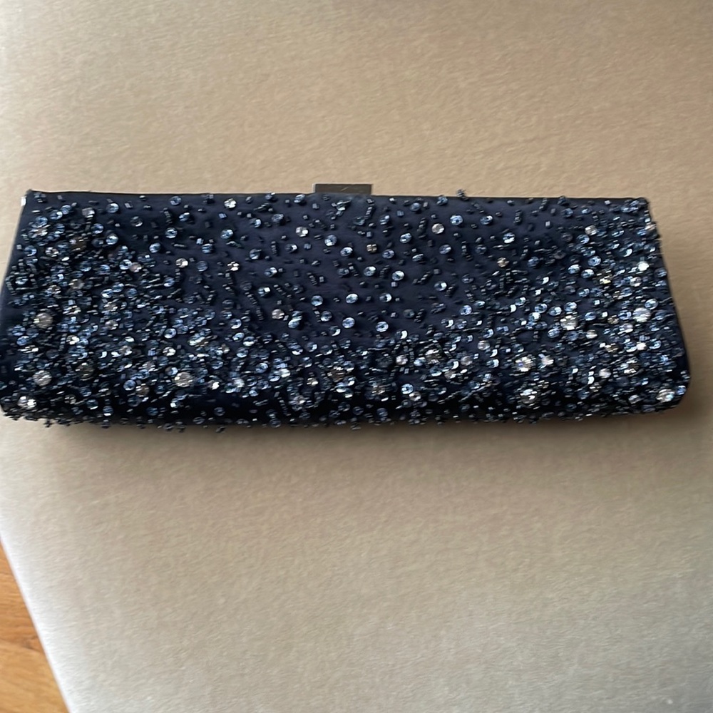 Crystal embellished black satin clutch.  Ann Taylor.  Like new.  12” by 4”.